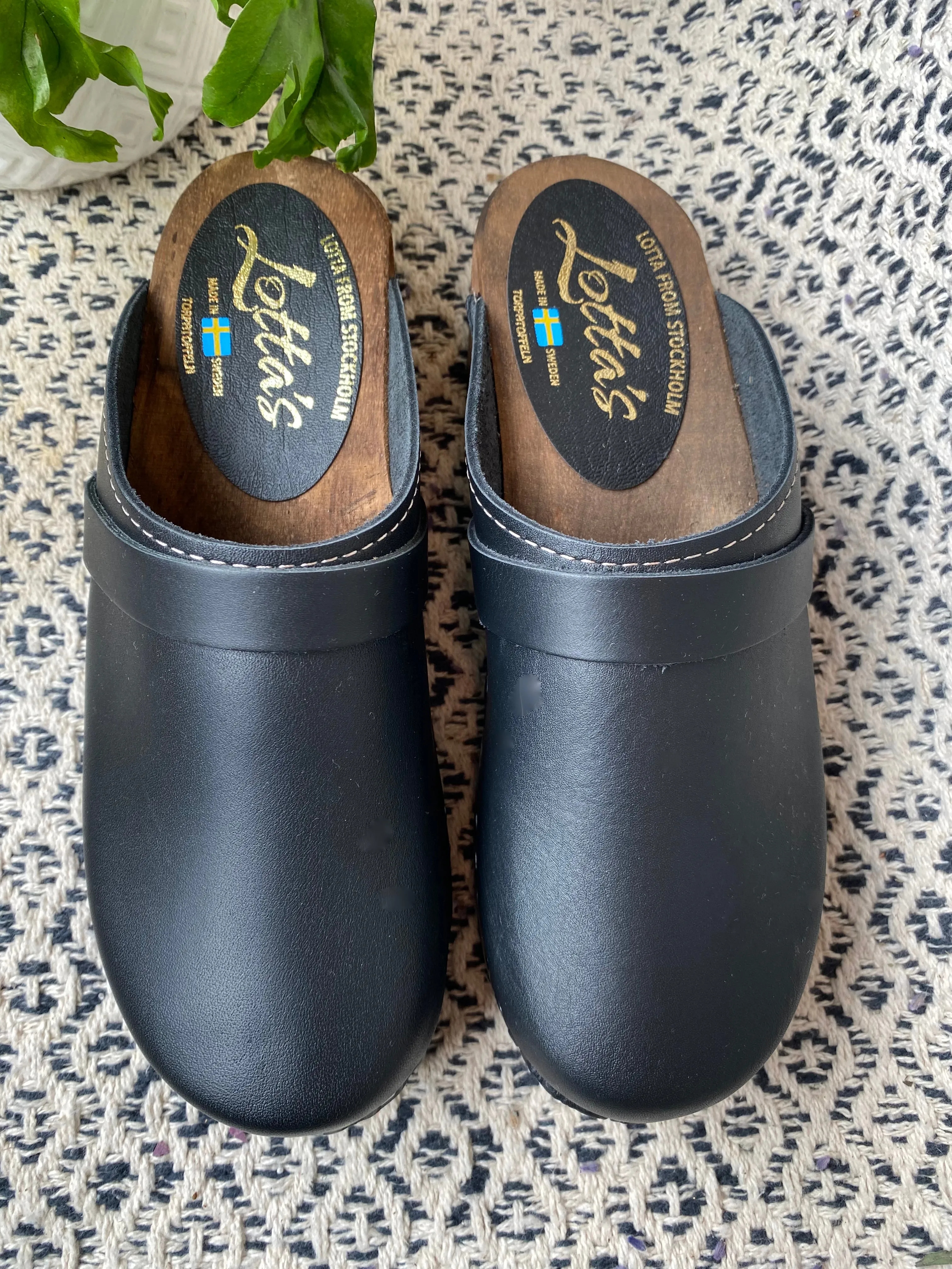 Stylish Black Clogs with Brown Base for Classic Look