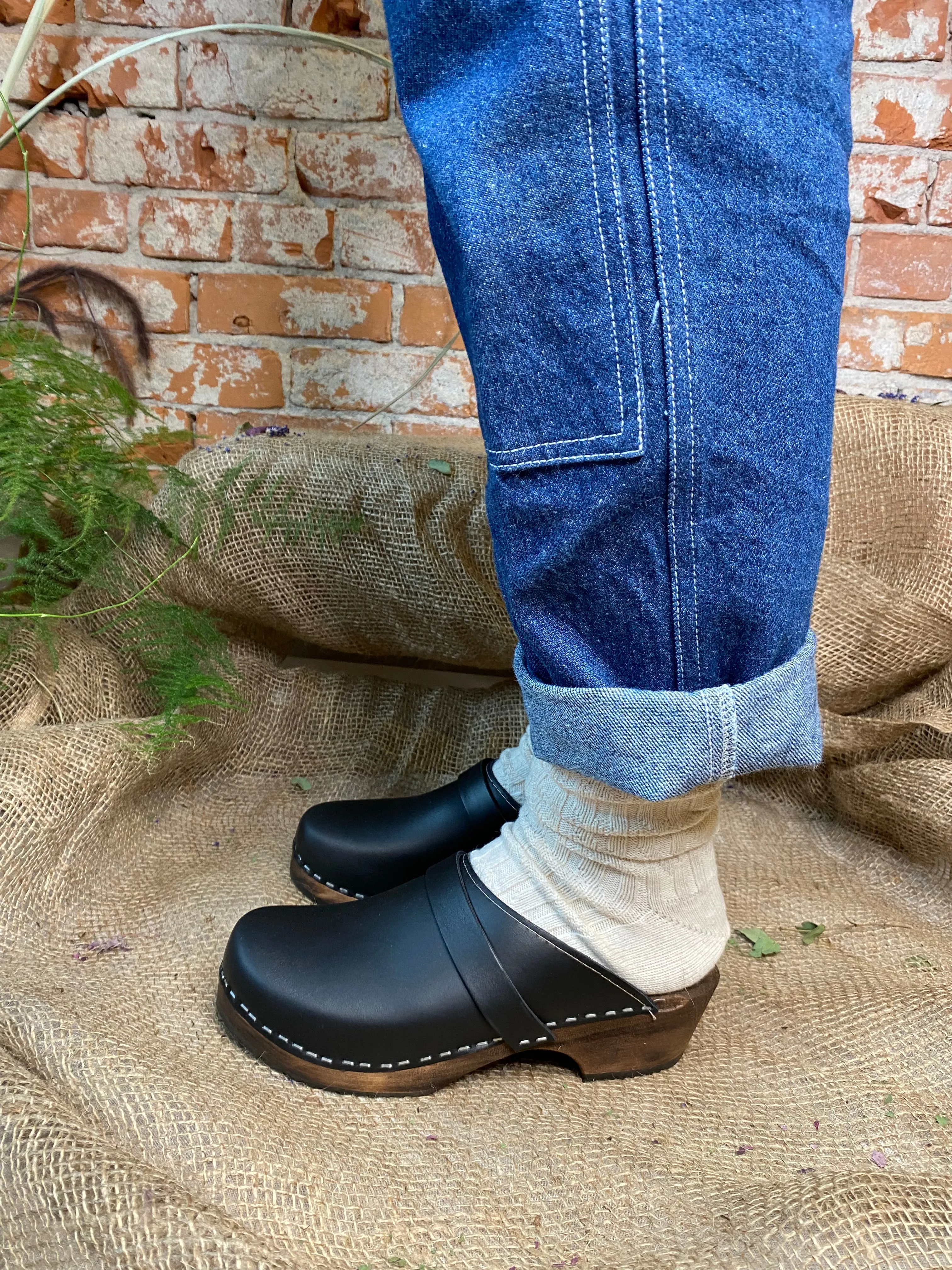 Stylish Black Clogs with Brown Base for Classic Look
