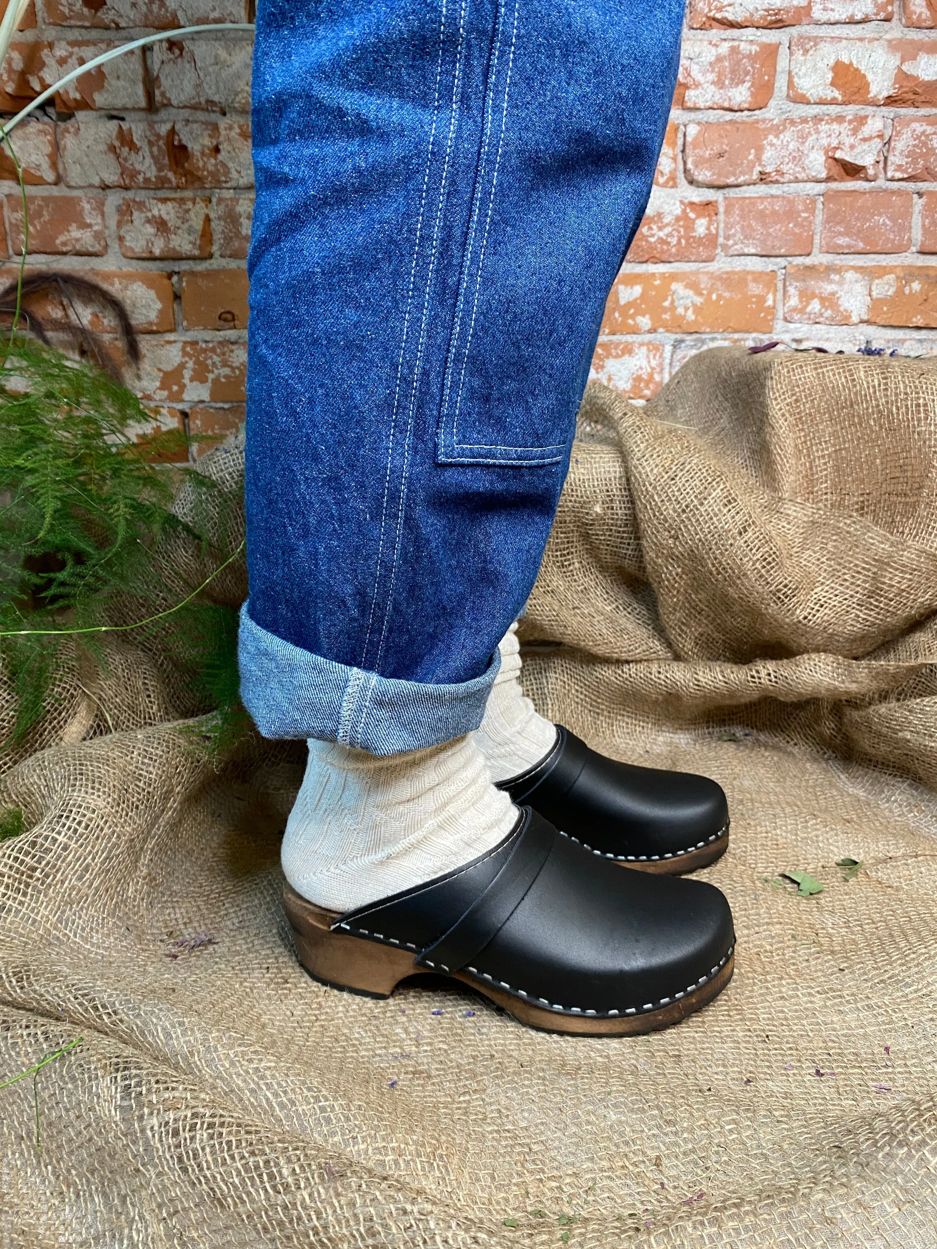 Stylish Black Clogs with Brown Base for Classic Look